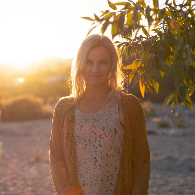 Portrait of Tricia Carr, experienced spiritual coach and compassionate guide of the Easy Intuition and Meditation Course, warmly inviting you to embark on a transformative journey.